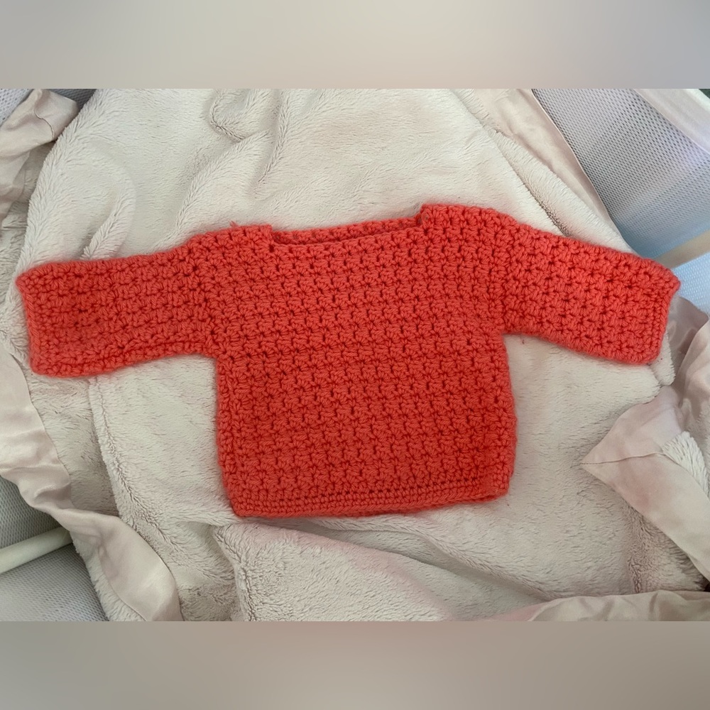 Coral knit baby sweater